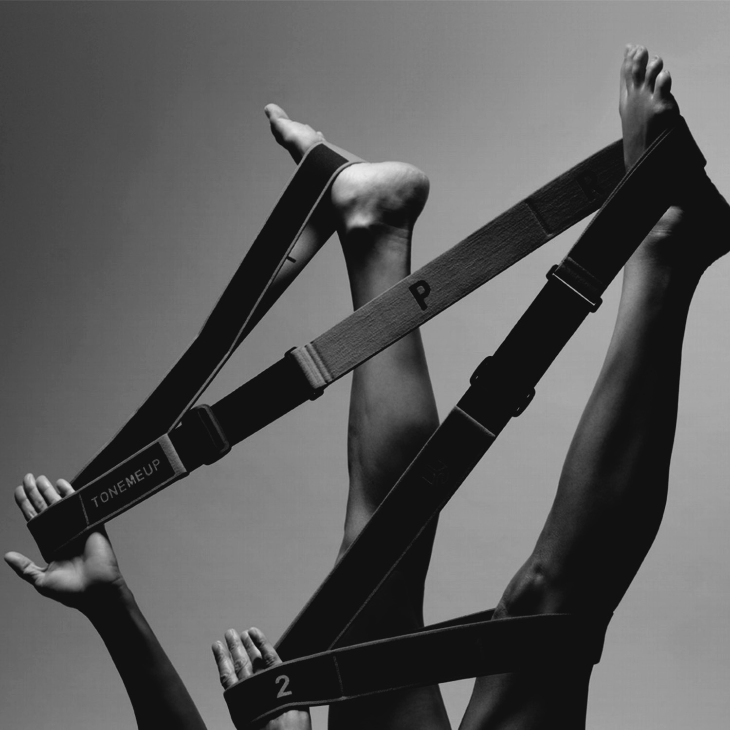 Dancers using TONEMEUP resistance bands